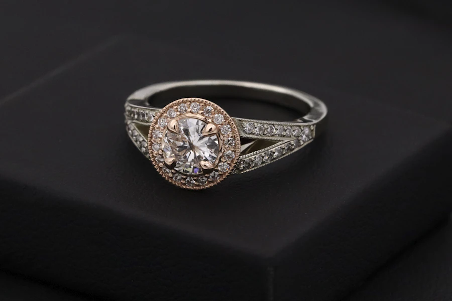 Diamond ring on black velvet — boutique attention to a single creator